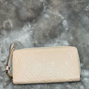 Authentic Louis Vuitton Monogram Empreinte Zippy Wallet